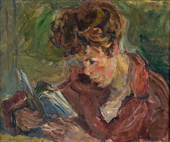 Portrait of a young woman reading a book