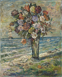 Flowers in a vase by the sea