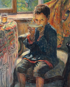 A young man drinking tea