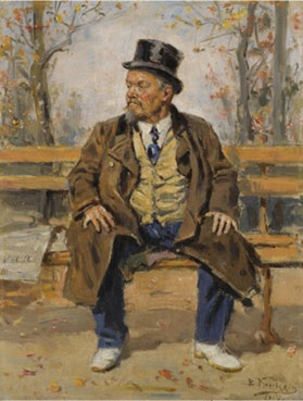 Portrait of a man sitting on a park bench