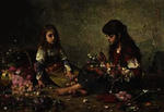 Two girls arranging flowers